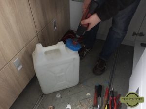 Drilling hole in cap of water canister